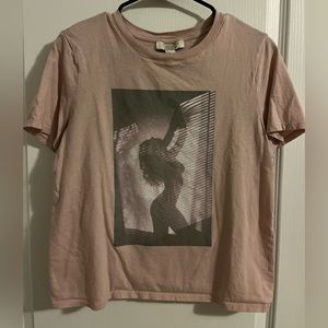 Pink Forever21 shirt with woman’s silhouette. Size M